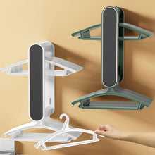 Laundry room hanger organizer with wall-mount feature.