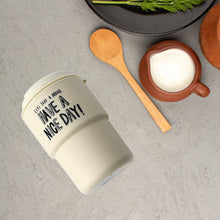 Portable plastic coffee cup with motivational message, perfect for travel and gifting.